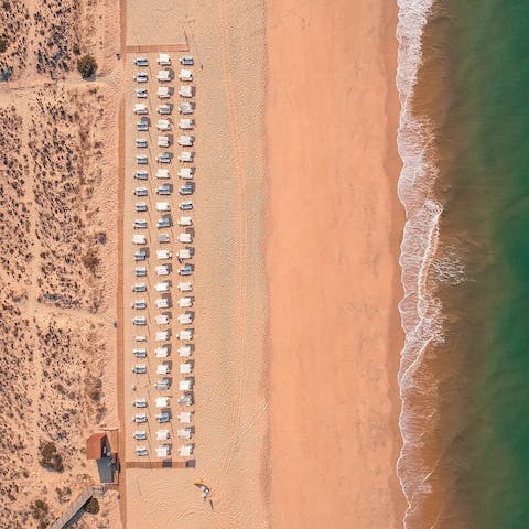 Spend lazy days on the sun-baked sands of Pego Beach