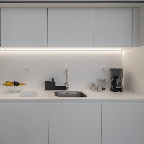 Fire up the coffee machine in the smart kitchen space as you hatch plans for the day