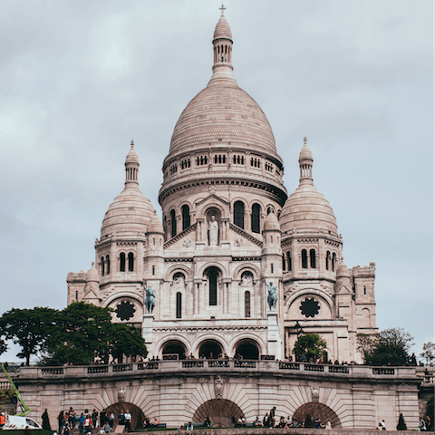 Visit the Sacré-Cœur, just over a fifteen-minute stroll away