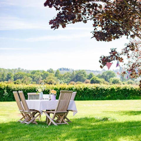 Dine alfresco in the fresh, country air in the two-acre garden