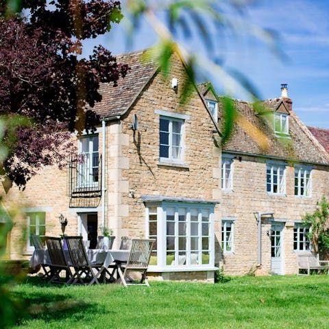 While away afternoons in the south-facing garden, playing football on the expansive lawn