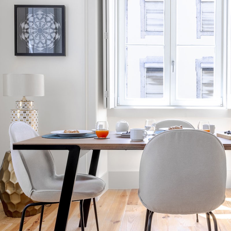 Start mornings with coffee and pastéis de nata at the bright dining table before setting off to explore the city