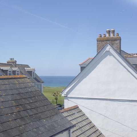 Take in glimpses of the clear blue waters of Fistral Bay across the nearby golf course