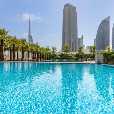 Swim gentle laps in the communal swimming pool 