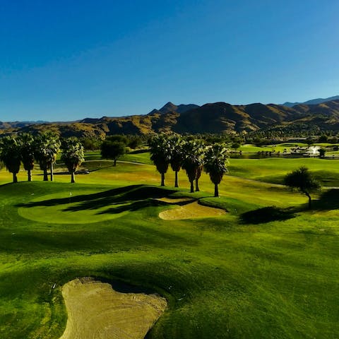 Tee off at the local golf course, a seven-minute drive away