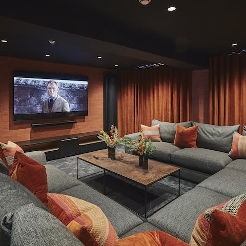 Catch the latest blockbuster in the home's cosy cinema room