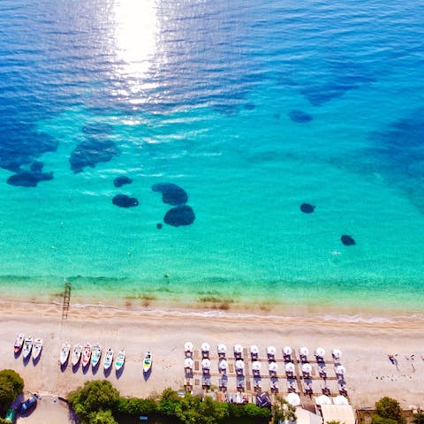Flip-flop down to the smooth pebble shores of Barbati Beach, just 600 metres away