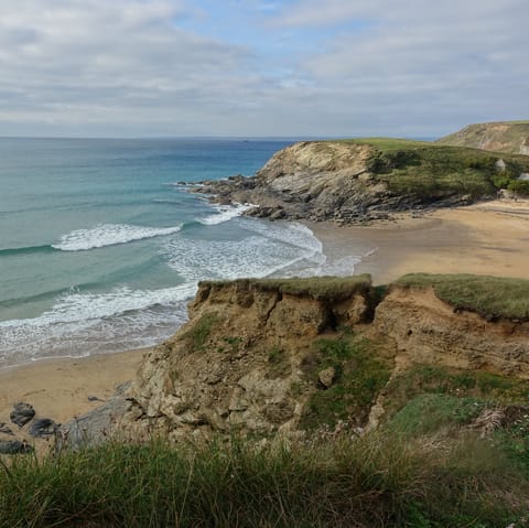 Go swimming at Northcott Mouth Beach, a fifteen-minute drive away