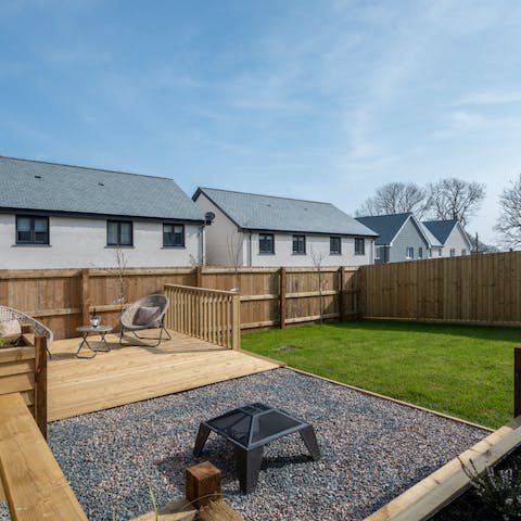 Sprawl out into the garden and decking area for a lunchtime barbecue
