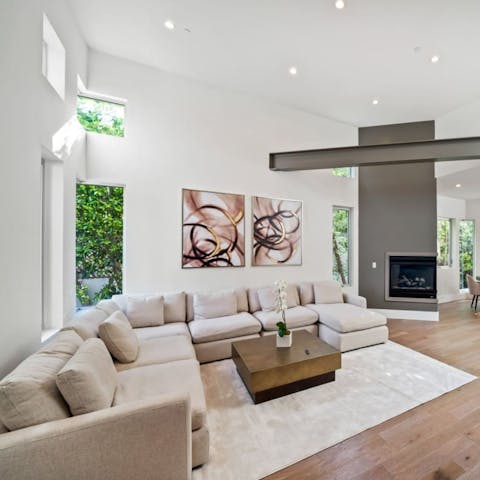Put your feet up by the fire in the open-plan ground floor