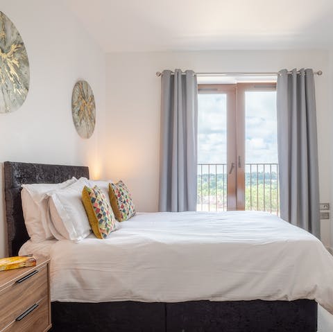 Wake up to leafy Hertfordshire views in the comfortable bedroom