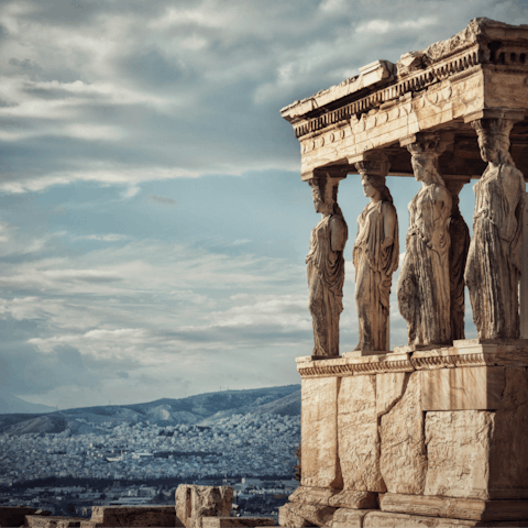 Visit the Acropolis of Athens, a fourteen-minute walk away