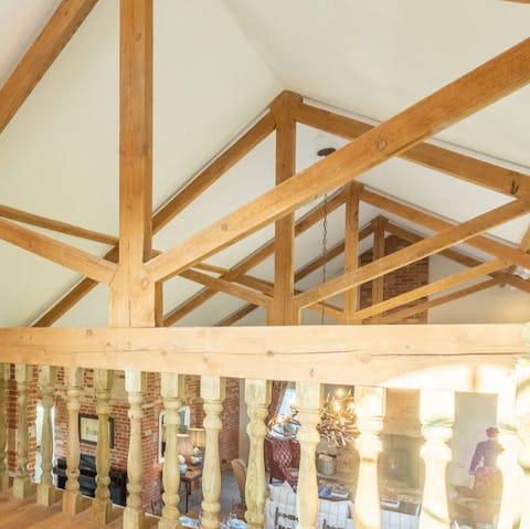 Enjoy design features such as exposed wooden rafters