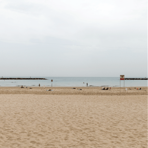 Soak up the golden sunshine on Herzliya Beach, just footsteps away