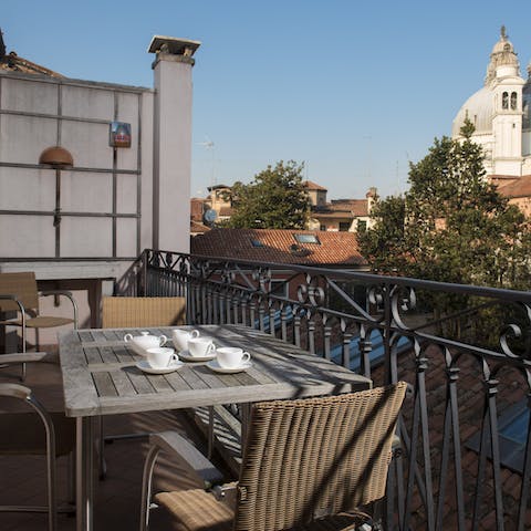 Uncork a bottle of Amarone della Valpolicella and soak up the rooftop views from your balcony