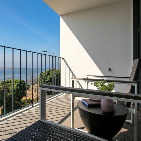 Admire the views of the River Douro on the two private balconies