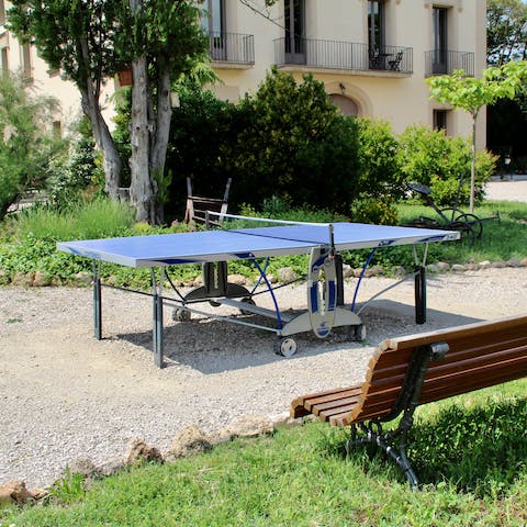 Challenge someone to a game of table tennis in the Spanish sun
