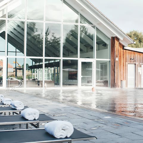 Get rejuvenated at the communal heated pool and spa