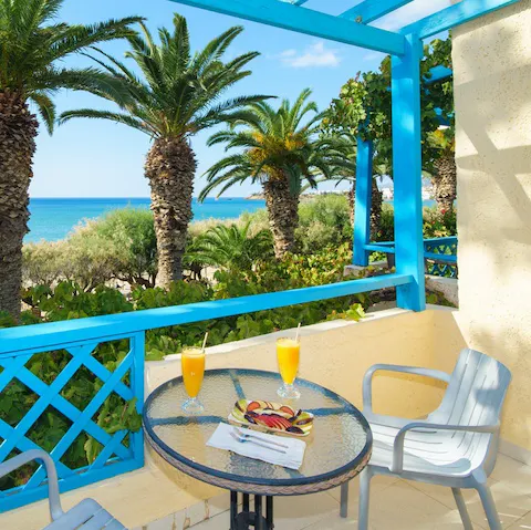 Sip your morning juice on the terrace as you drink in the sea views