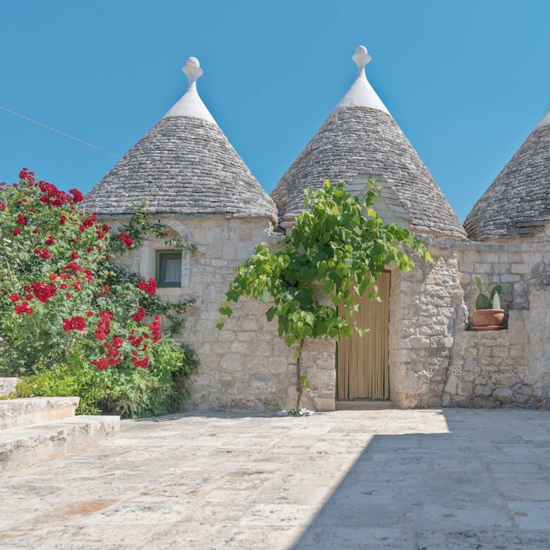 Stay in a traditional trulli house in the Itria Valley