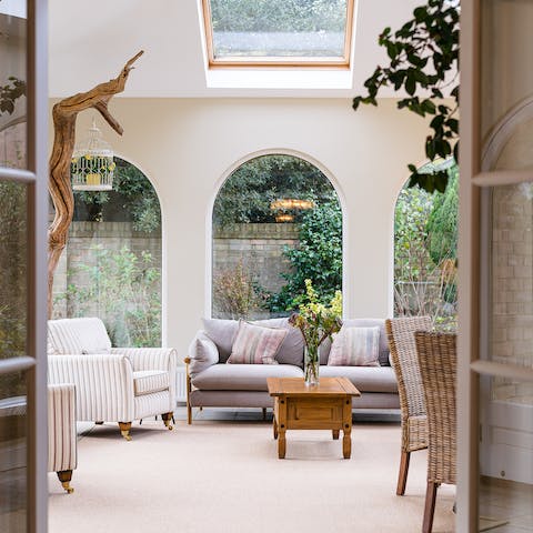 Cosy up in the sunroom and enjoy a glass of natural wine 