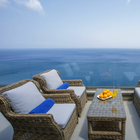 Enjoy a morning juice on your private balcony as the breeze drifts in from the ocean