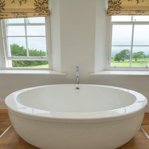Unwind in an enormous oval bathtub 