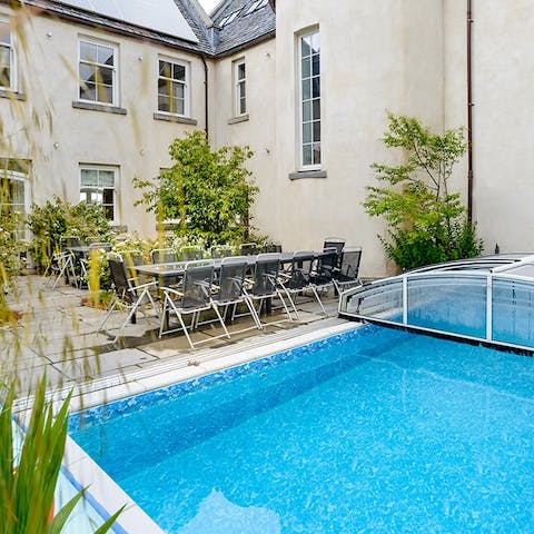 Take a dip in the heated outdoor swimming pool