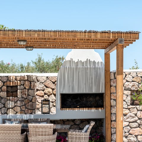 Cook up some souvlaki on the barbecue and dine alfresco under the pergola
