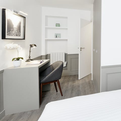 Catch up with your nine-to-five at the dedicated workspace in the bedroom
