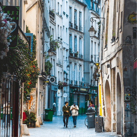 Wander a few minutes to explore the colourful, cobbled streets of your local area, Le Marais