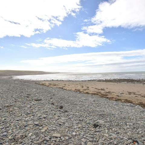 Feel the sea between your toes at the shingle beach, a mile from your front door