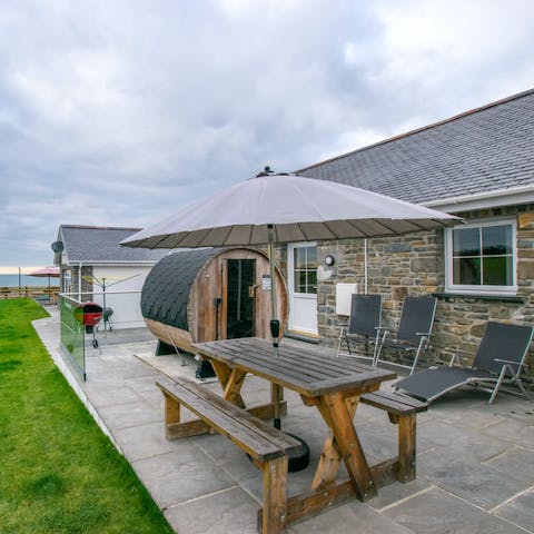 Dine alfresco in the garden, surrounded by the working farm