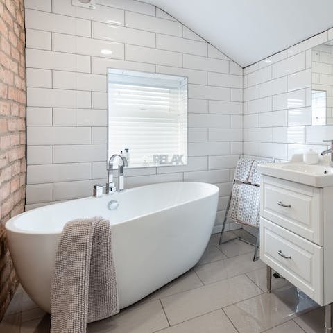 Soak in the freestanding tub for a relaxing start to the day