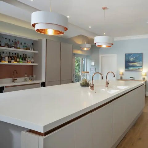 Prepare meals (and drinks) in the fabulous island kitchen