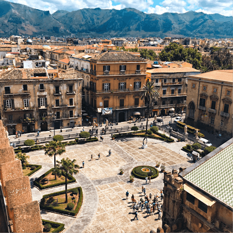 Lose yourself in the narrow streets and grand piazzas of Palermo's old town