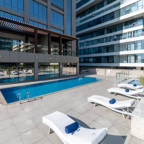 Enjoy a few leisurely laps of the shared outdoor pool