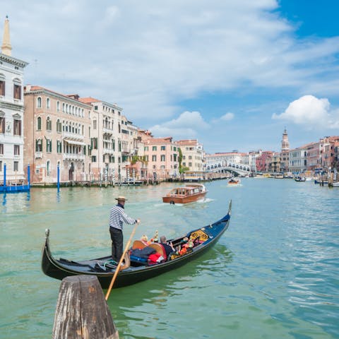 Grab a gondola from the nearby promenade and explore the city