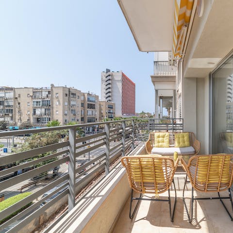 Soak up the early morning sun with a coffee in hand on your balcony