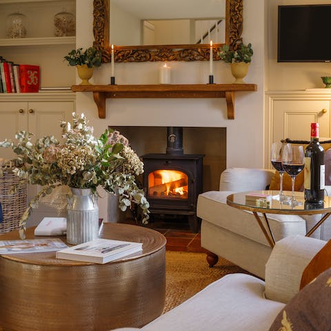 Enjoy a glass of wine next to the log burner as the Hertfordshire weather turns chilly