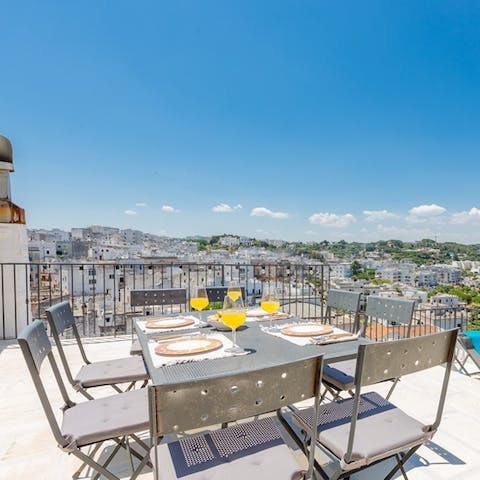 Take in scenic views over the Ostuni rooftops across to the Adriatic Sea 