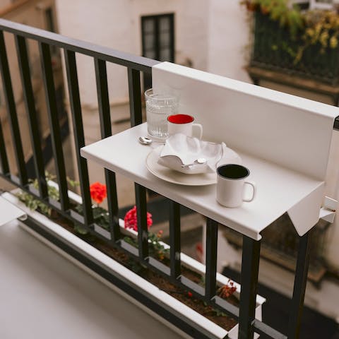 Enjoy coffee and Spanish pastries out on the balcony each morning