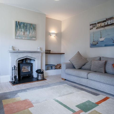 Snuggle up by the log burner after a day on the Pembrokeshire coast