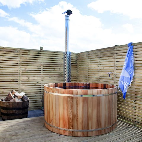 Sink into the wood-fired hot tub for a long soak under the stars
