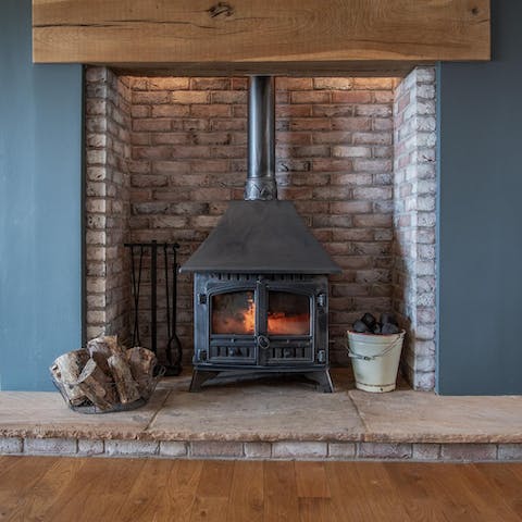 Curl up next to the wood-burning stove on chilly evenings
