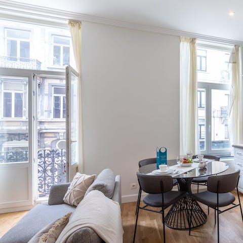 Throw open the door to the Juliet balcony and watch the Brussels' street-life below