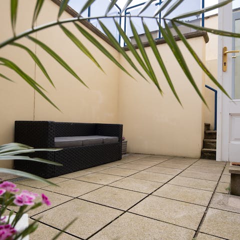 Make the most of the apartment's private courtyard during the warmer months