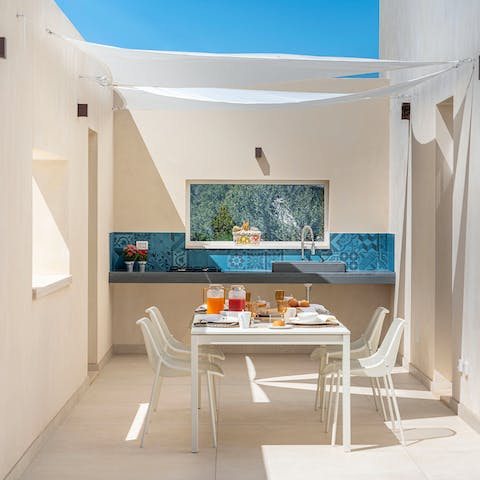 Rustle up an alfresco feast in the summer kitchen or hire a private chef to cook a traditional Sicilian meal
