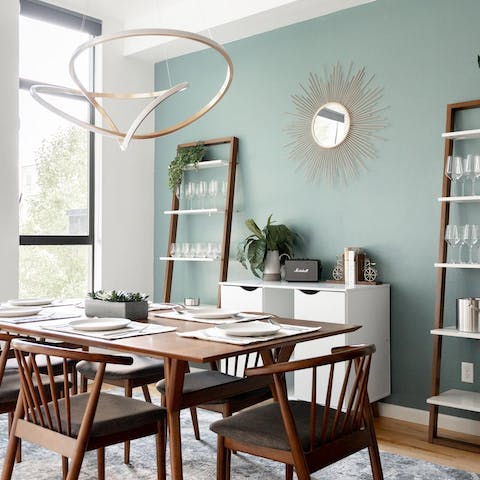 Enjoy group meals in the stylish, mint-green dining area