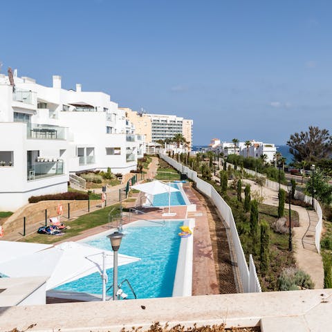 Cool off from the Spanish sun in the communal pools